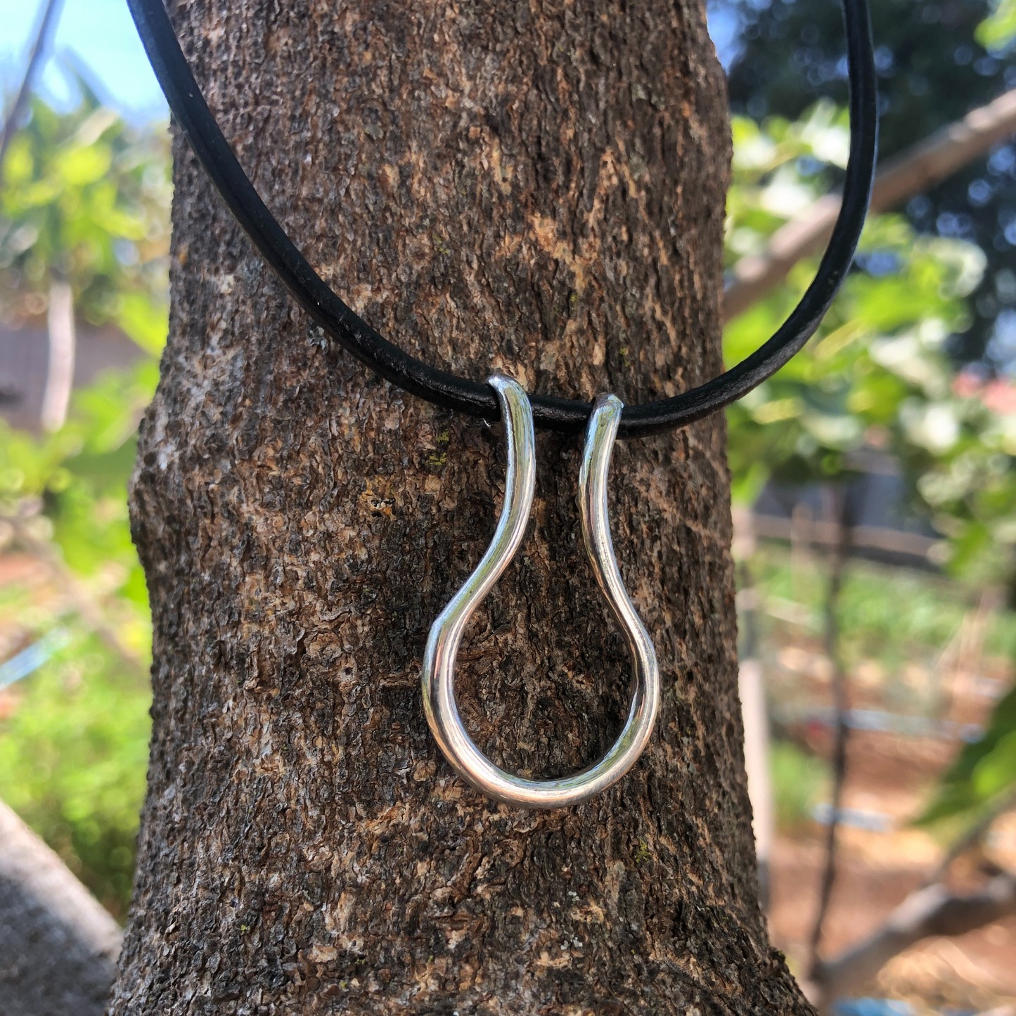 African handmade silver and leather ring holder necklace men made in Zimbabwe by the Zuri collection