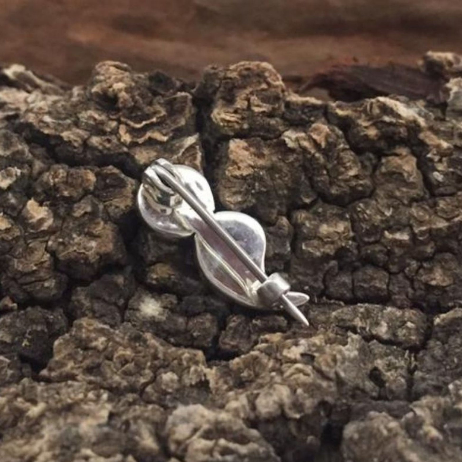 Silver semicolon pin made in Zimbabwe